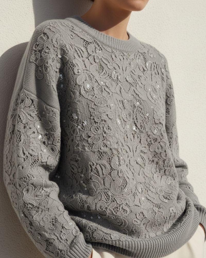 Grey knitted lace jumper worn on the body, in detail