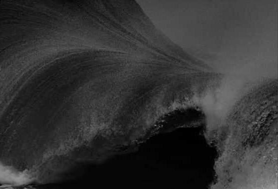 Wave breaking, black-and-white photograph